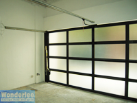 Inside look of garage with 1-piece canopy door, very well lighted