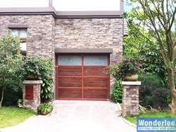 single car Alu frame garage door with glasses and wood panels