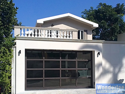 Tilt garage door with tinted glasses