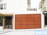 garage tilt door on a slope